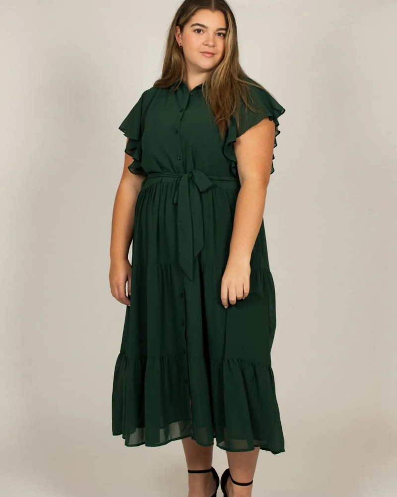 Front of a model wearing a size 3X Melinda Midi Tiered Shirt Dress Green in Green by ANNICK. | dia_product_style_image_id:317729